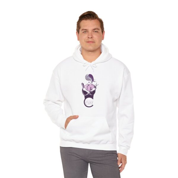 A man wearing a white hoodie with an image of a cat.