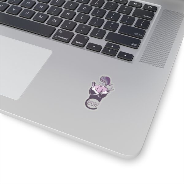 A laptop with a mouse on it's keyboard.